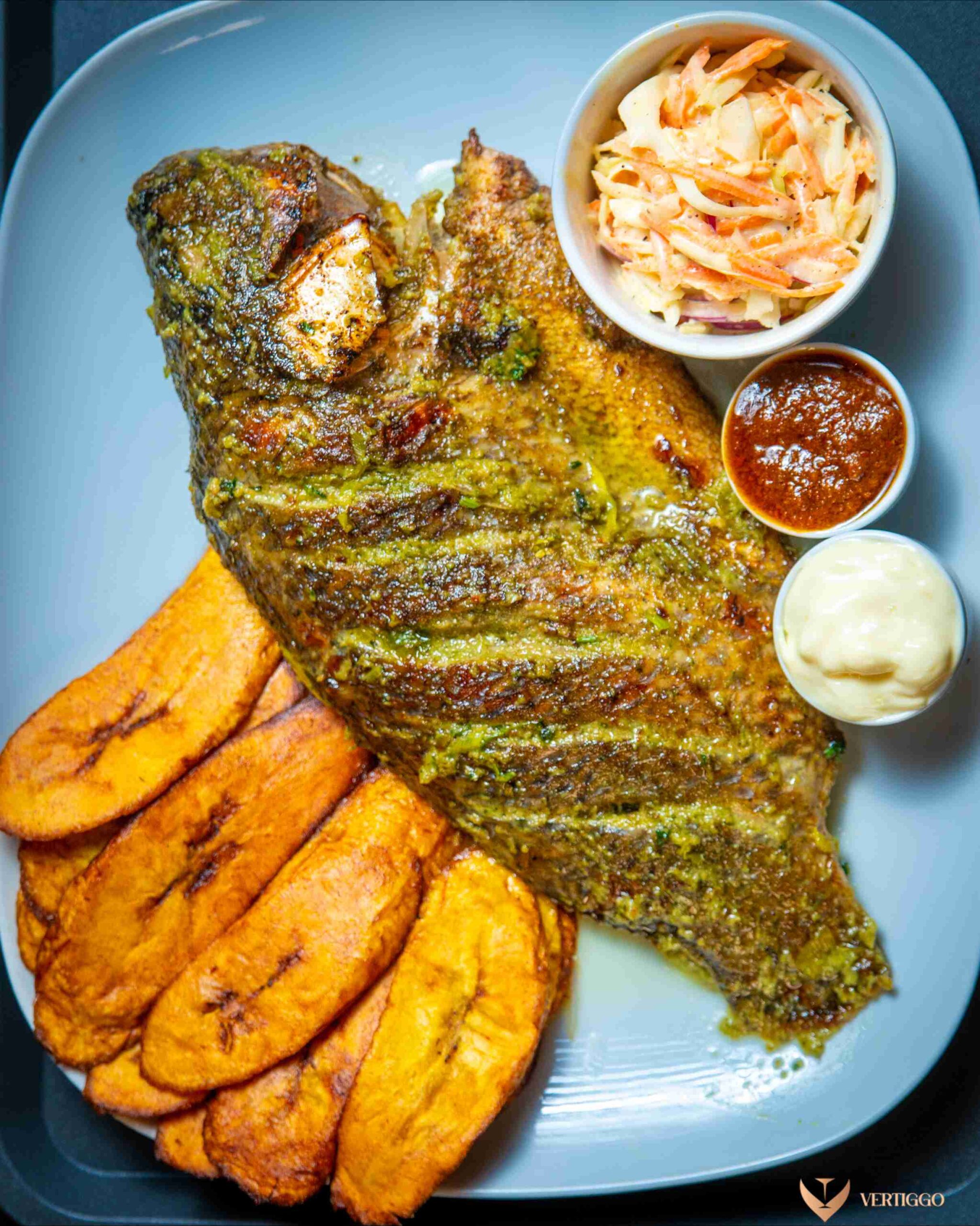Grilled tilapia with plantain or fries