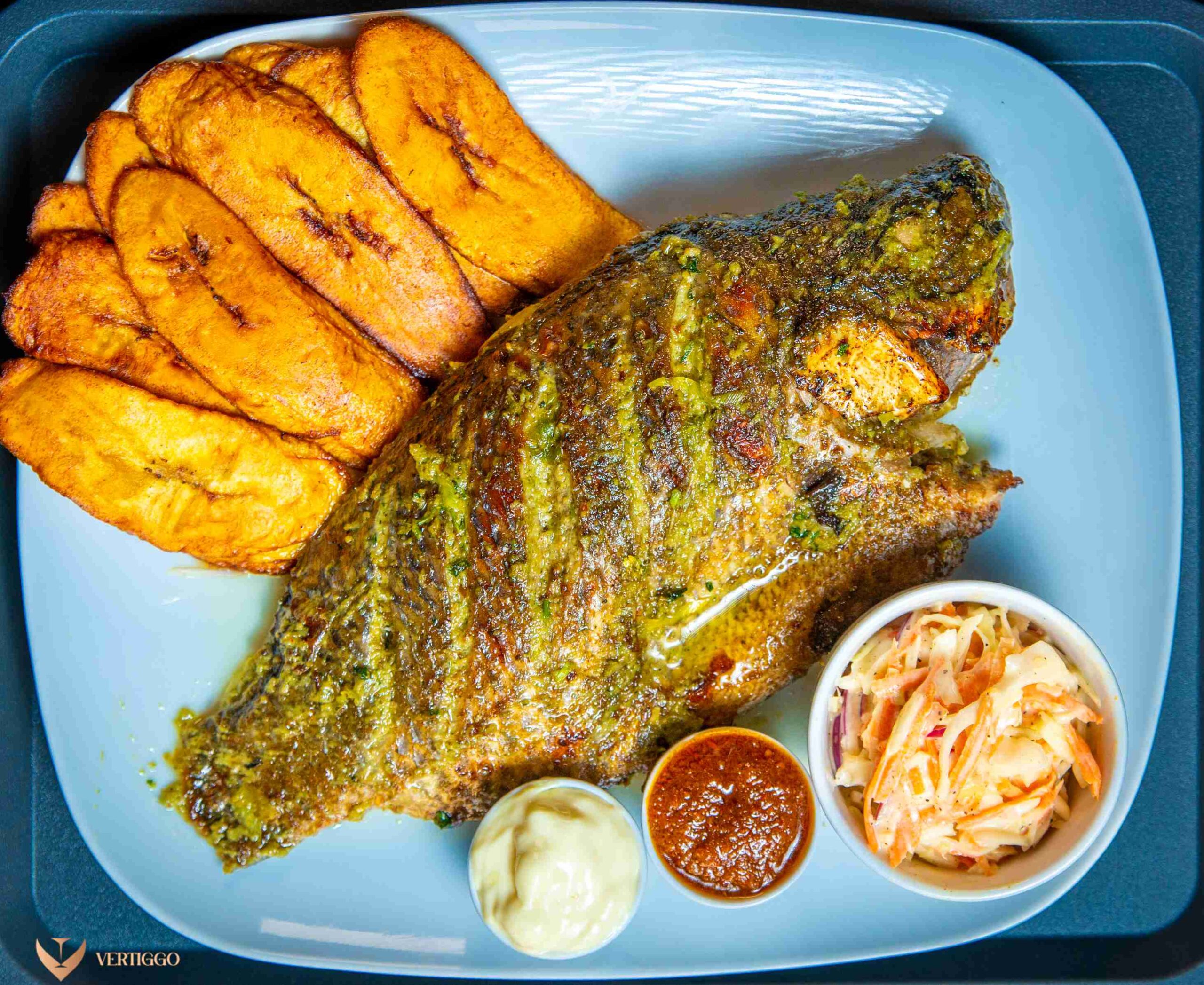 Grilled tilapia with plantain or fries