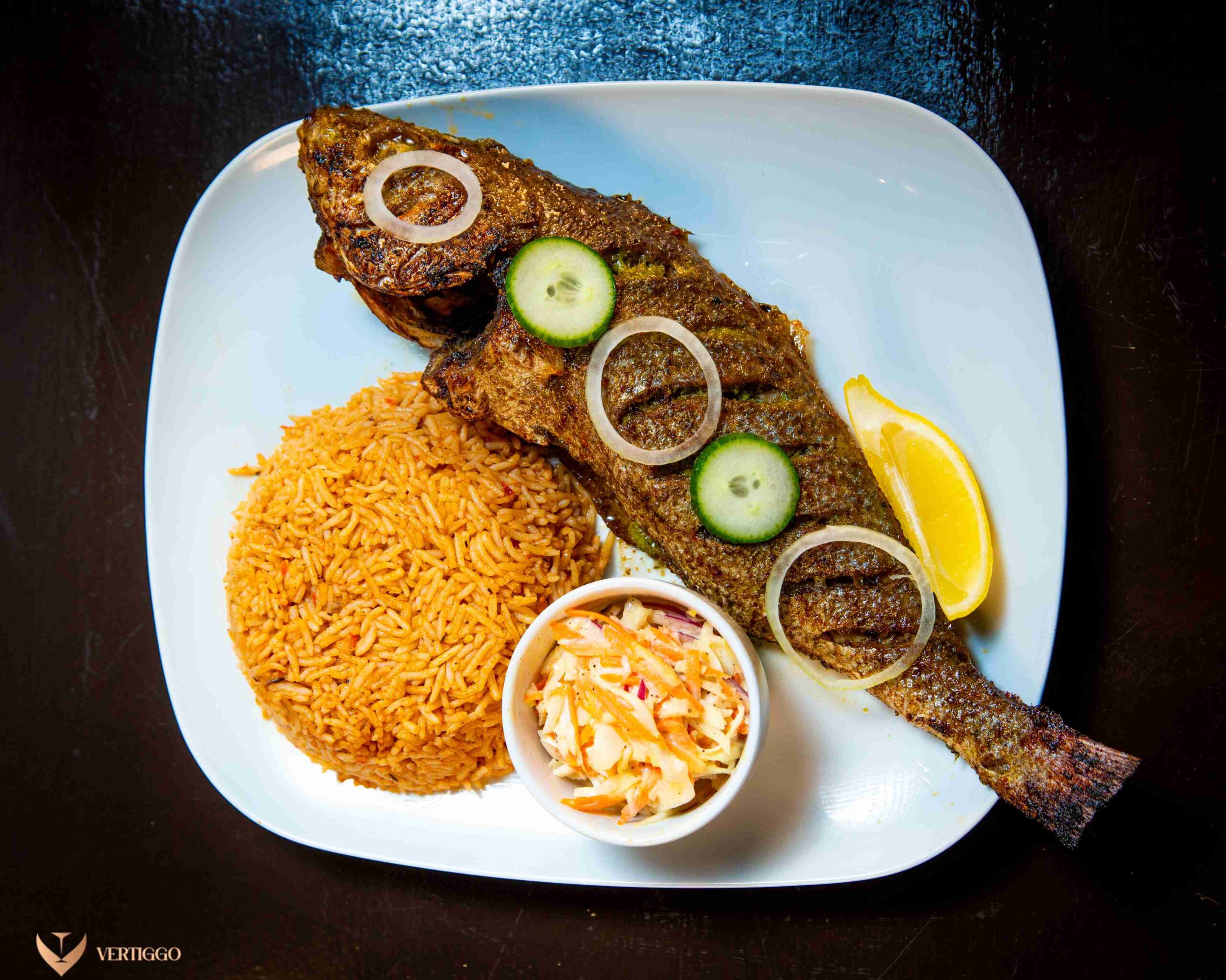 Jollof rice, plantain, turkey or fish