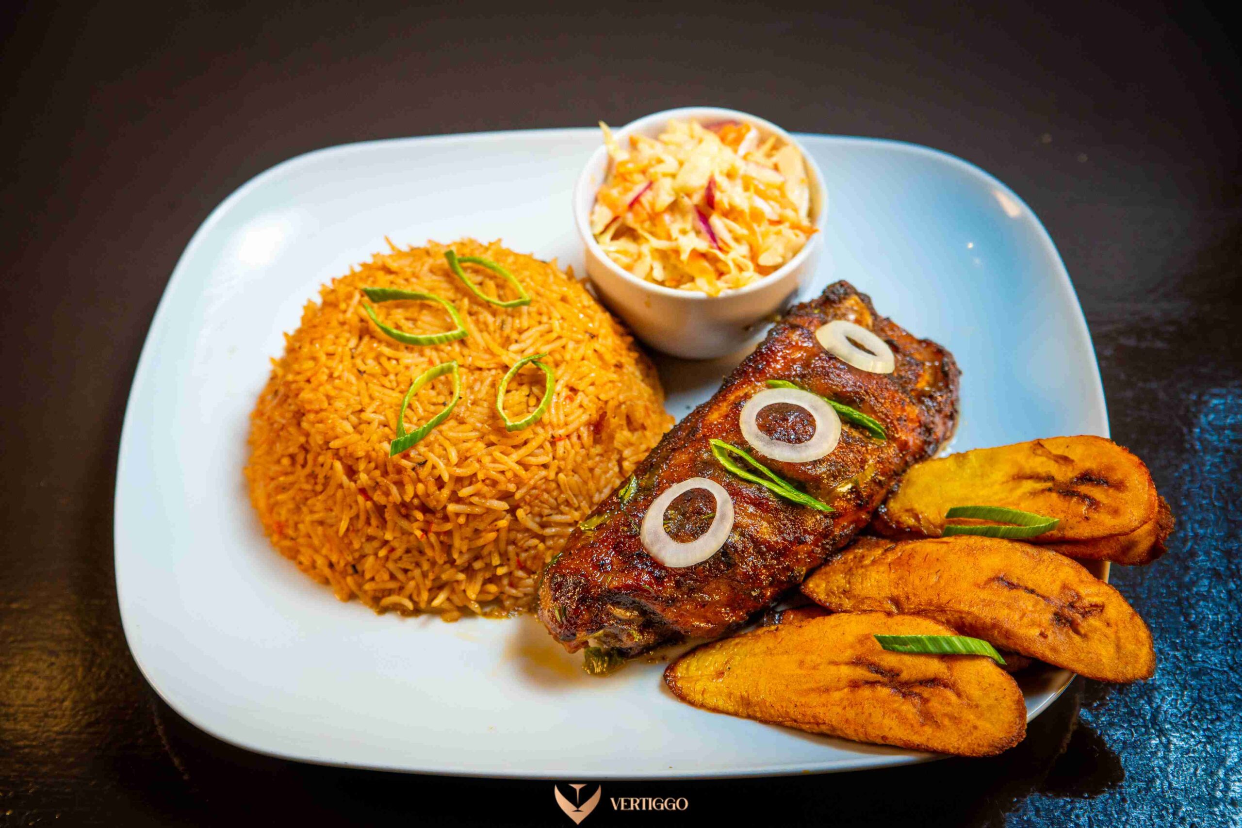 Jollof rice, plantain, turkey or fish